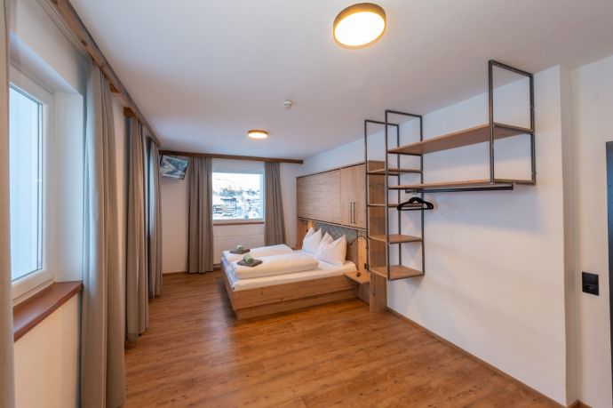 Slaapkamer met extra bedden